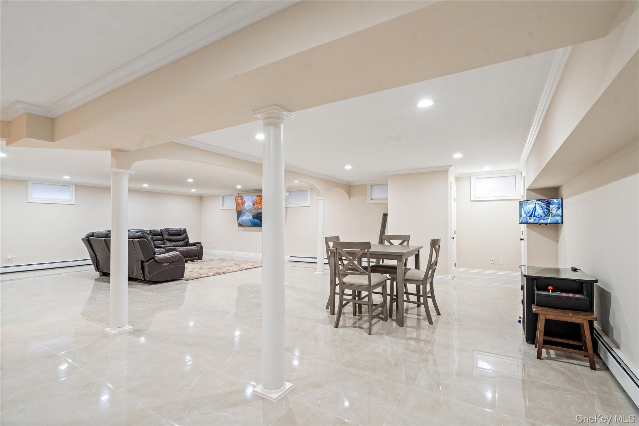 176 Sagamore Drive Plainview, NY 11803 - Photo 21 of 40 a kitchen with a table and chairs in it
