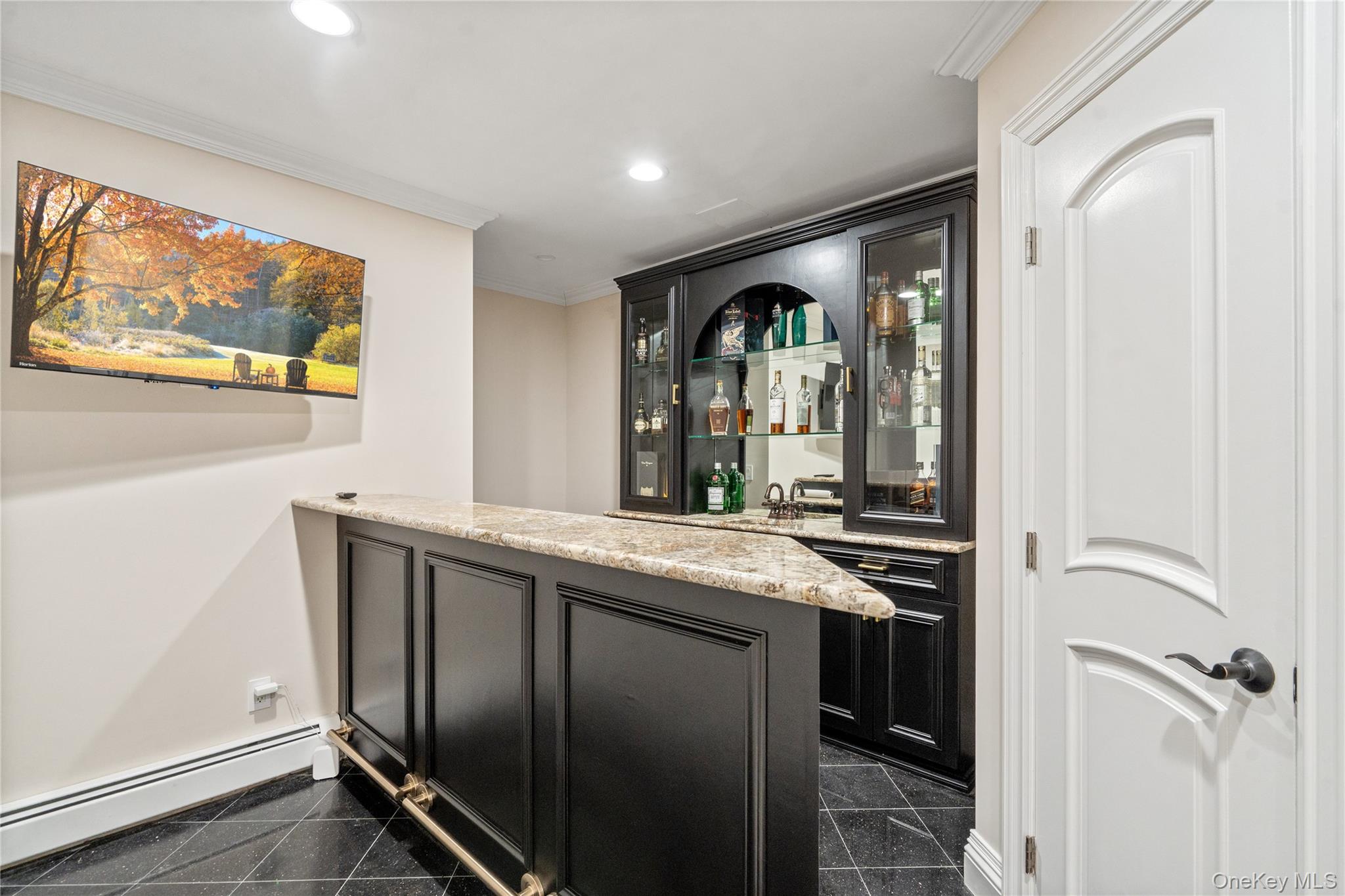 176 Sagamore Drive Plainview, NY 11803 - Photo 22 of 40 a kitchen with stainless steel appliances granite countertop a refrigerator and a sink