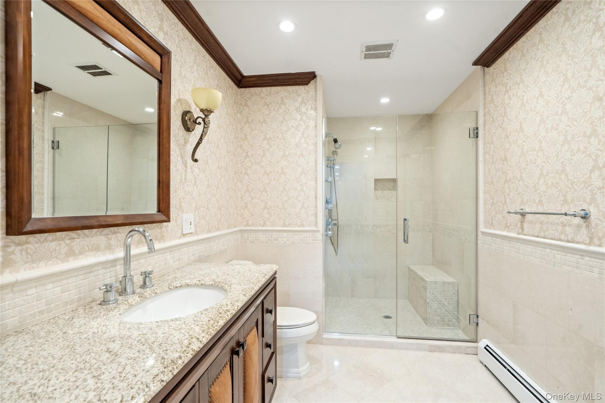 176 Sagamore Drive Plainview, NY 11803 - Photo 24 of 40 a bathroom with a granite countertop sink a toilet and shower