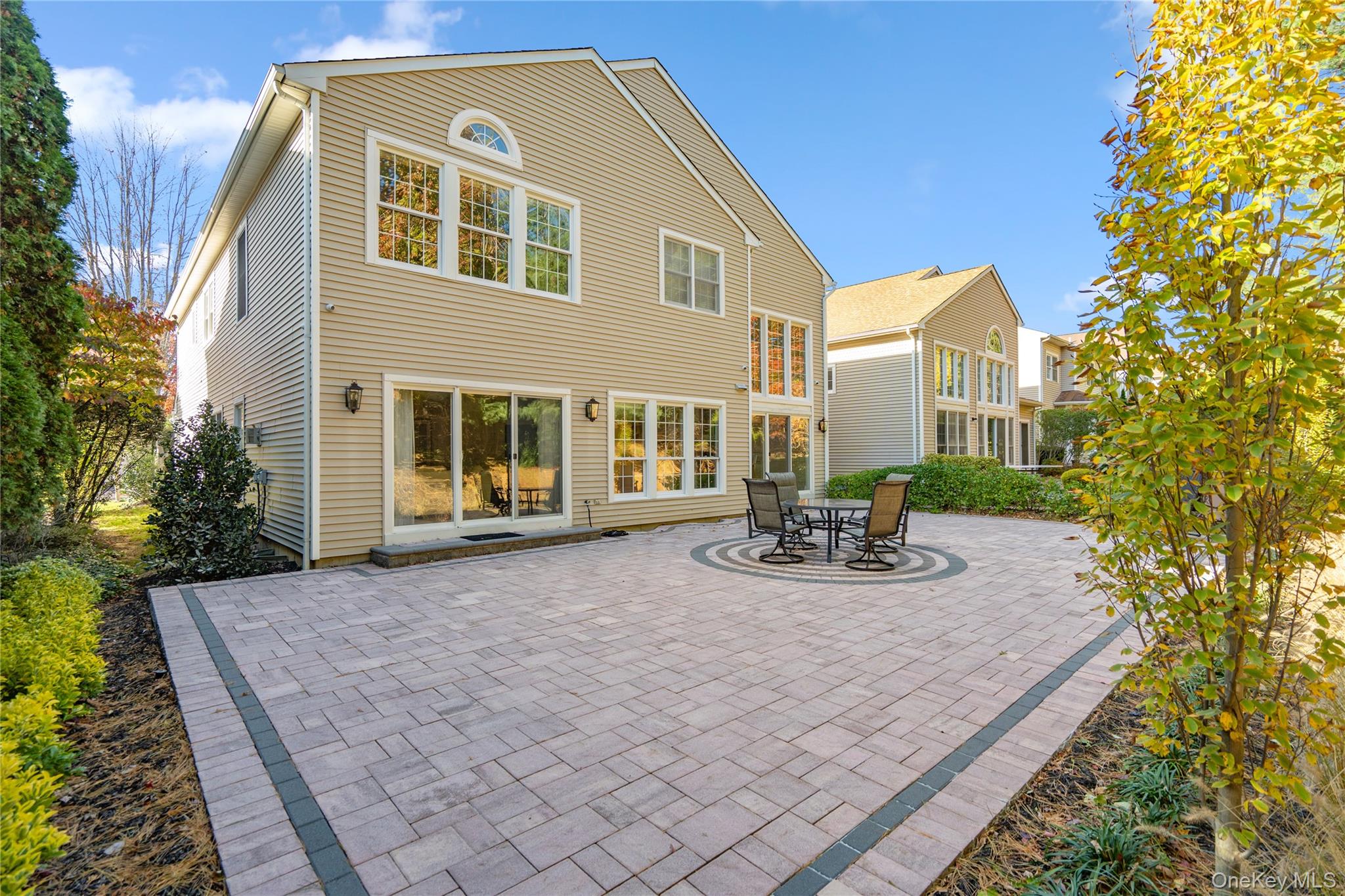 176 Sagamore Drive Plainview, NY 11803 - Photo 28 of 40 a front view of a house with garden
