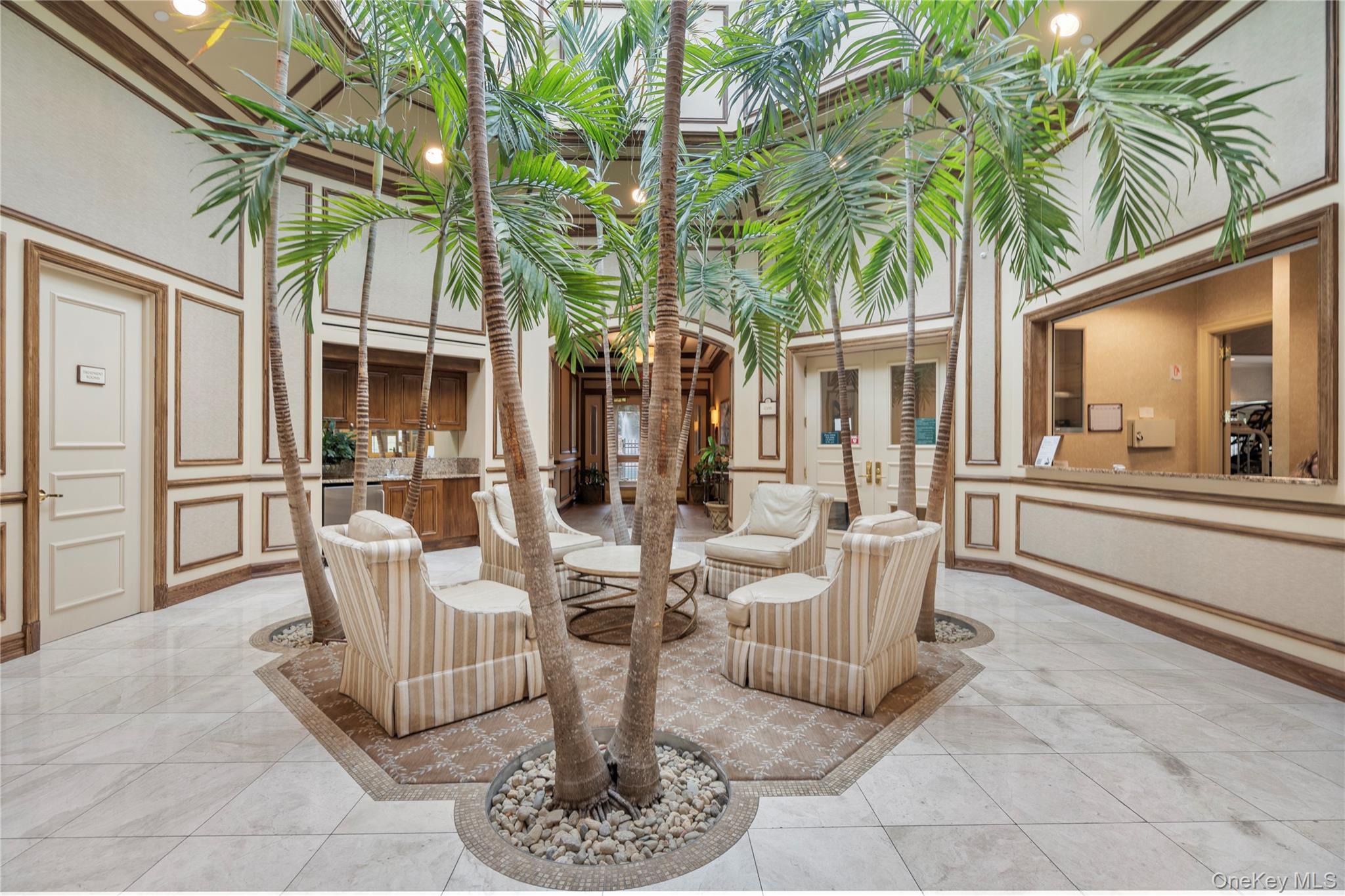 176 Sagamore Drive Plainview, NY 11803 - Photo 34 of 40 a view of a patio with couches table and chairs and potted plants