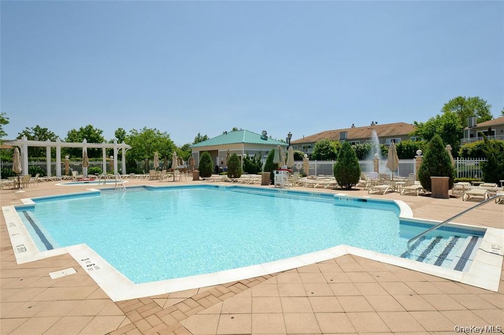 176 Sagamore Drive Plainview, NY 11803 - Photo 36 of 40 a view of a swimming pool with chairs