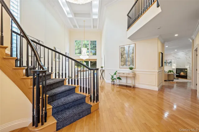 a view of an entryway and wooden floor
