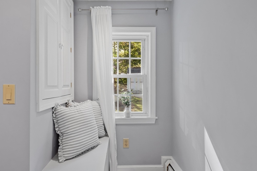 25 Naples Road Melrose, MA 02176 - Photo 17 of 36 a view of a bedroom with a window