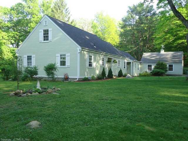 21 Wig Hill Road Chester, CT 06412 - Photo 1 of 1 a front view of house with yard and green space