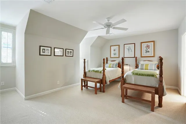 a bedroom with furniture and a window