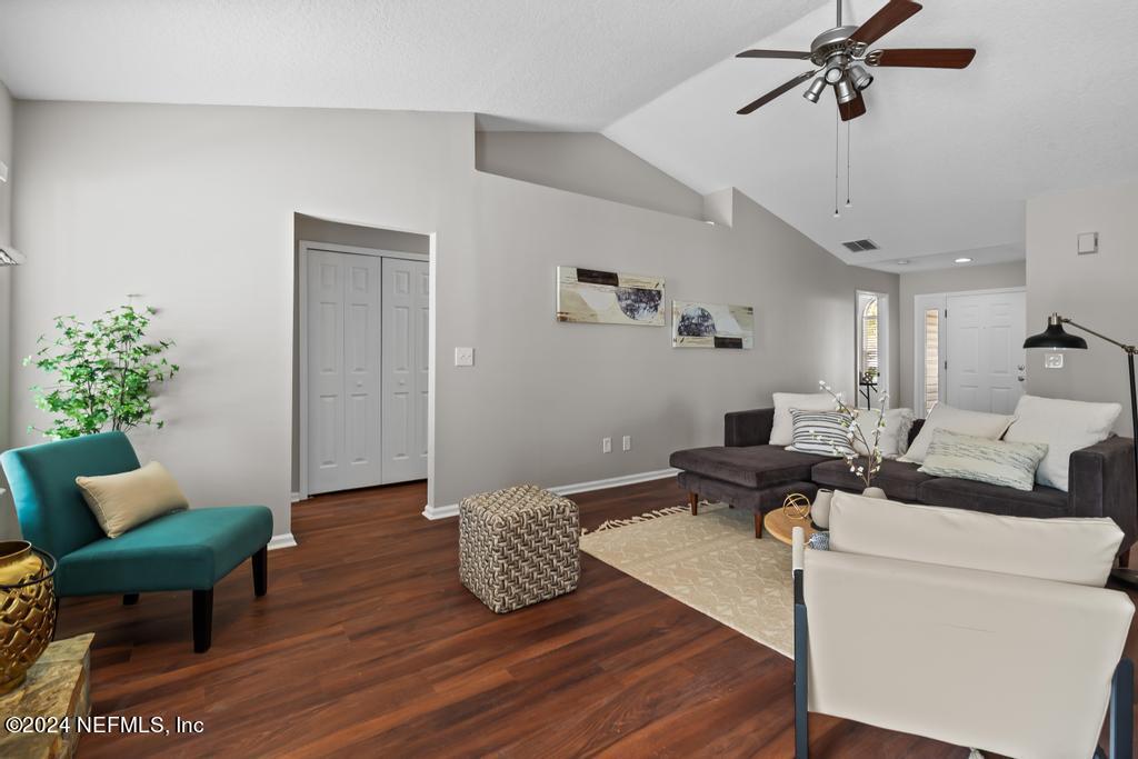 96014 Morton Lane Yulee, FL 32097 - Photo 13 of 45 a living room with furniture and a potted plant
