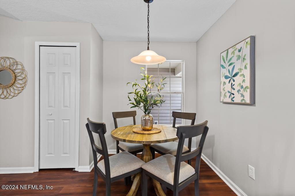 96014 Morton Lane Yulee, FL 32097 - Photo 16 of 45 a dining room with furniture and window