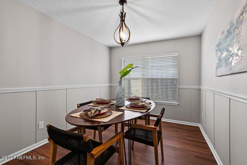 96014 Morton Lane Yulee, FL 32097 - Photo 23 of 45 a table and chairs in a small room