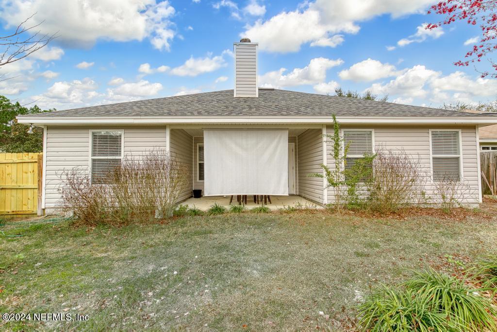 96014 Morton Lane Yulee, FL 32097 - Photo 43 of 45 a front view of house with yard