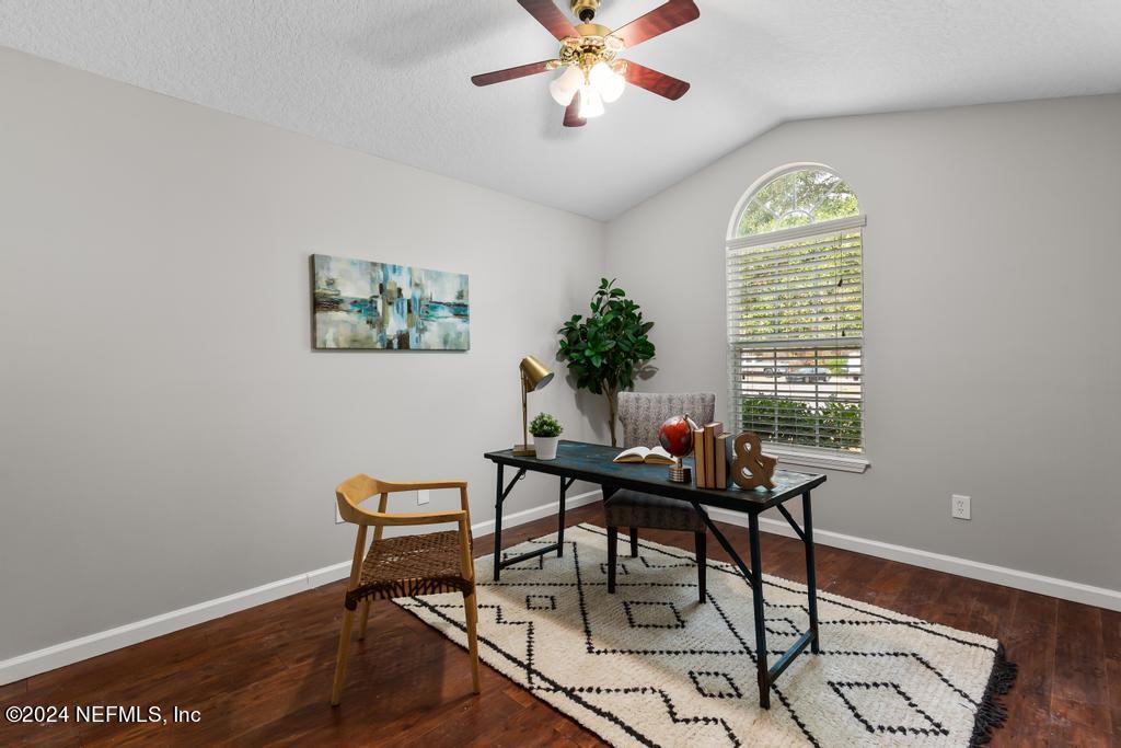 96014 Morton Lane Yulee, FL 32097 - Photo 9 of 45 a workspace with furniture window and wooden floor