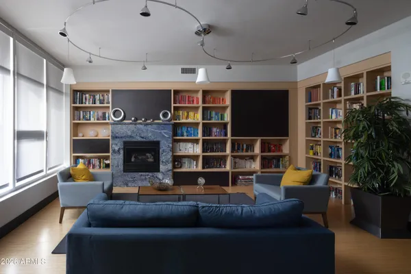 a room with pool table and a flat screen tv