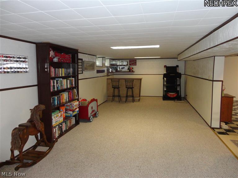 12116 Grannis Road Garfield Heights, OH 44125 - Photo 12 of 14 Long view of huge Rec Room in Basement