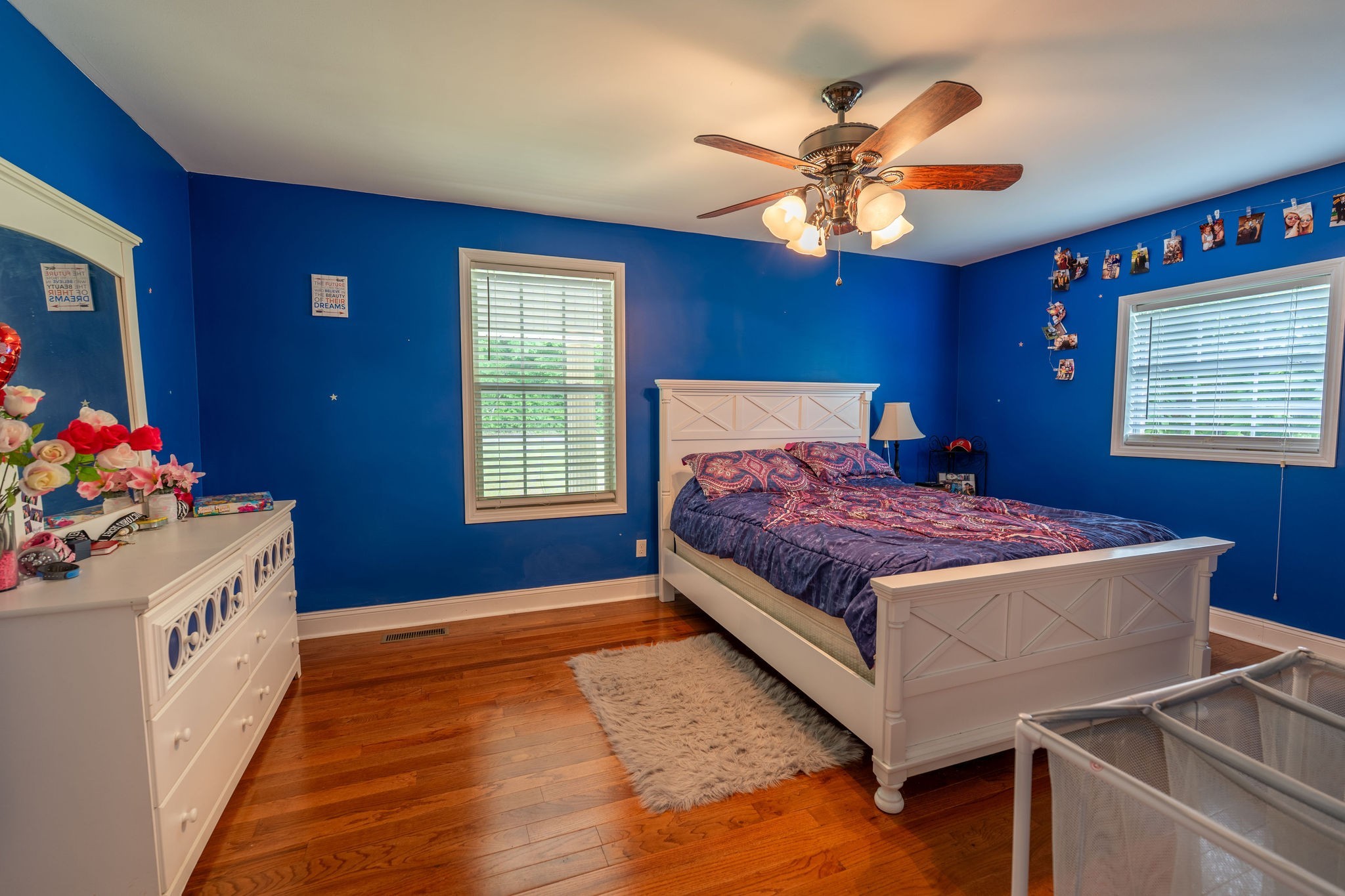 8276 Middle Butler Road Iron City, TN 38463 - Photo 22 of 27 a bedroom with a bed and a chandelier