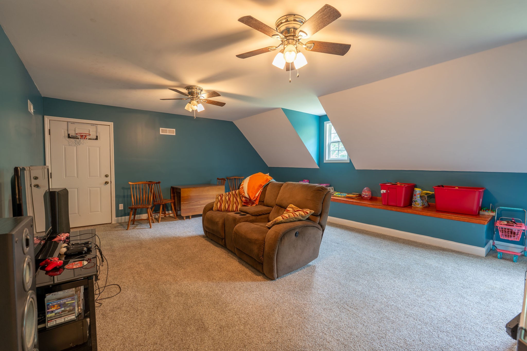 8276 Middle Butler Road Iron City, TN 38463 - Photo 23 of 27 a living room with furniture and a chandelier