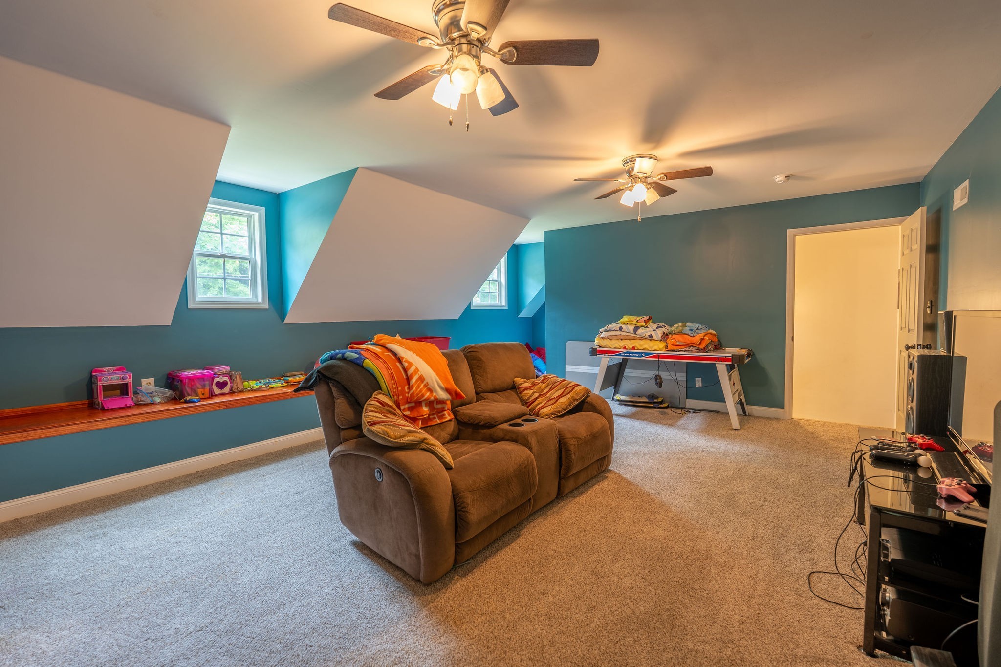 8276 Middle Butler Road Iron City, TN 38463 - Photo 24 of 27 a living room with furniture and a flat screen tv