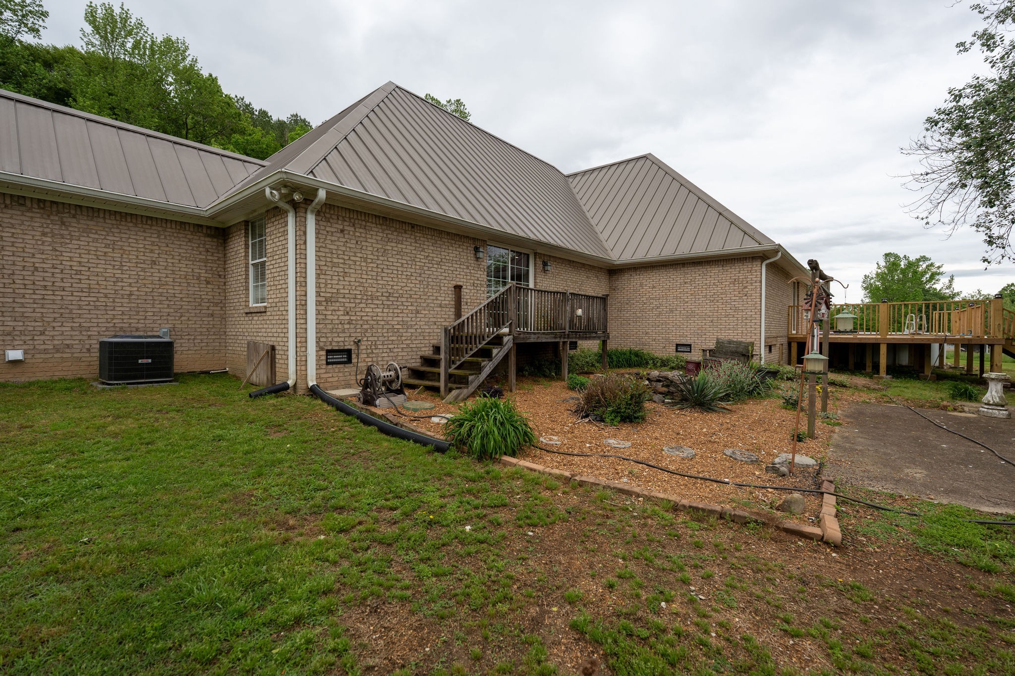 8276 Middle Butler Road Iron City, TN 38463 - Photo 5 of 27 a house view with a garden space