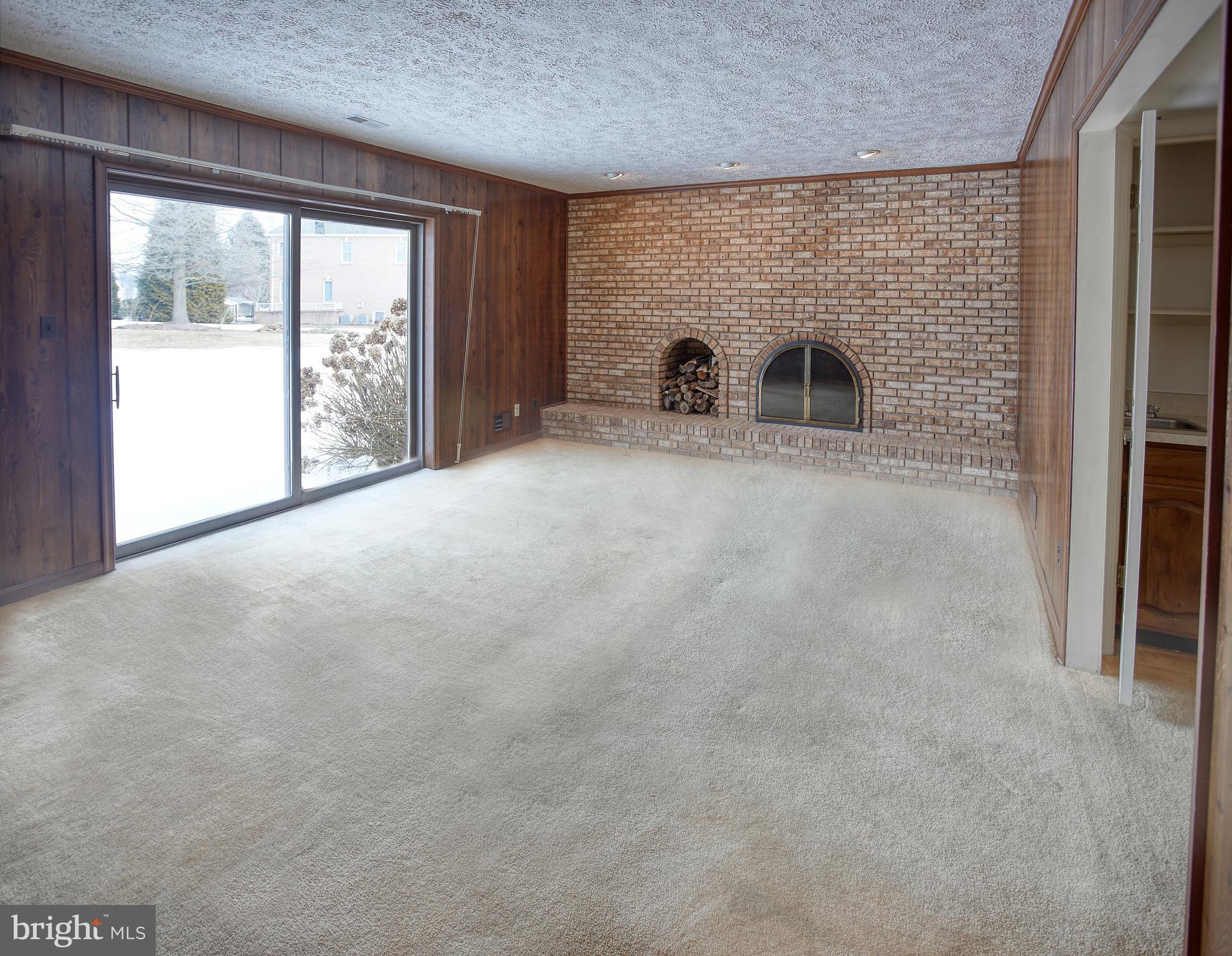 3835 Justin Road Monkton, MD 21111 - Photo 12 of 17 Spacious family room with wood burning fp