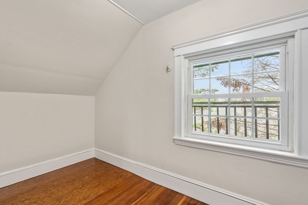 95 Russett Road Boston, MA 02132 - Photo 17 of 42 an empty room with a window