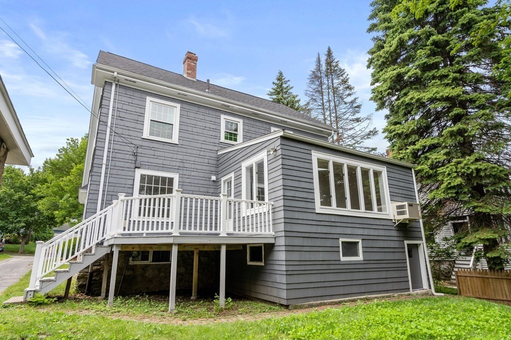 95 Russett Road Boston, MA 02132 - Photo 40 of 42 a front view of a house with a yard