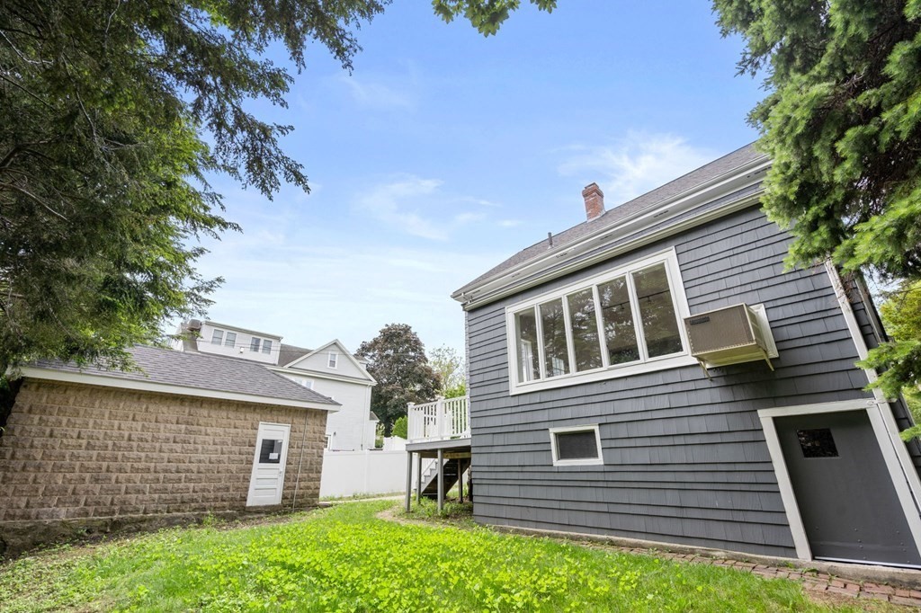95 Russett Road Boston, MA 02132 - Photo 41 of 42 a view of a house with a backyard