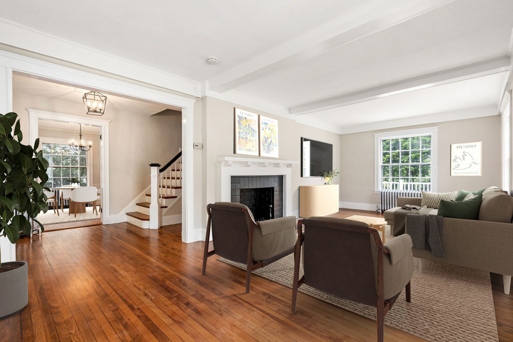 95 Russett Road Boston, MA 02132 - Photo 7 of 42 a living room with fireplace furniture and a wooden floor