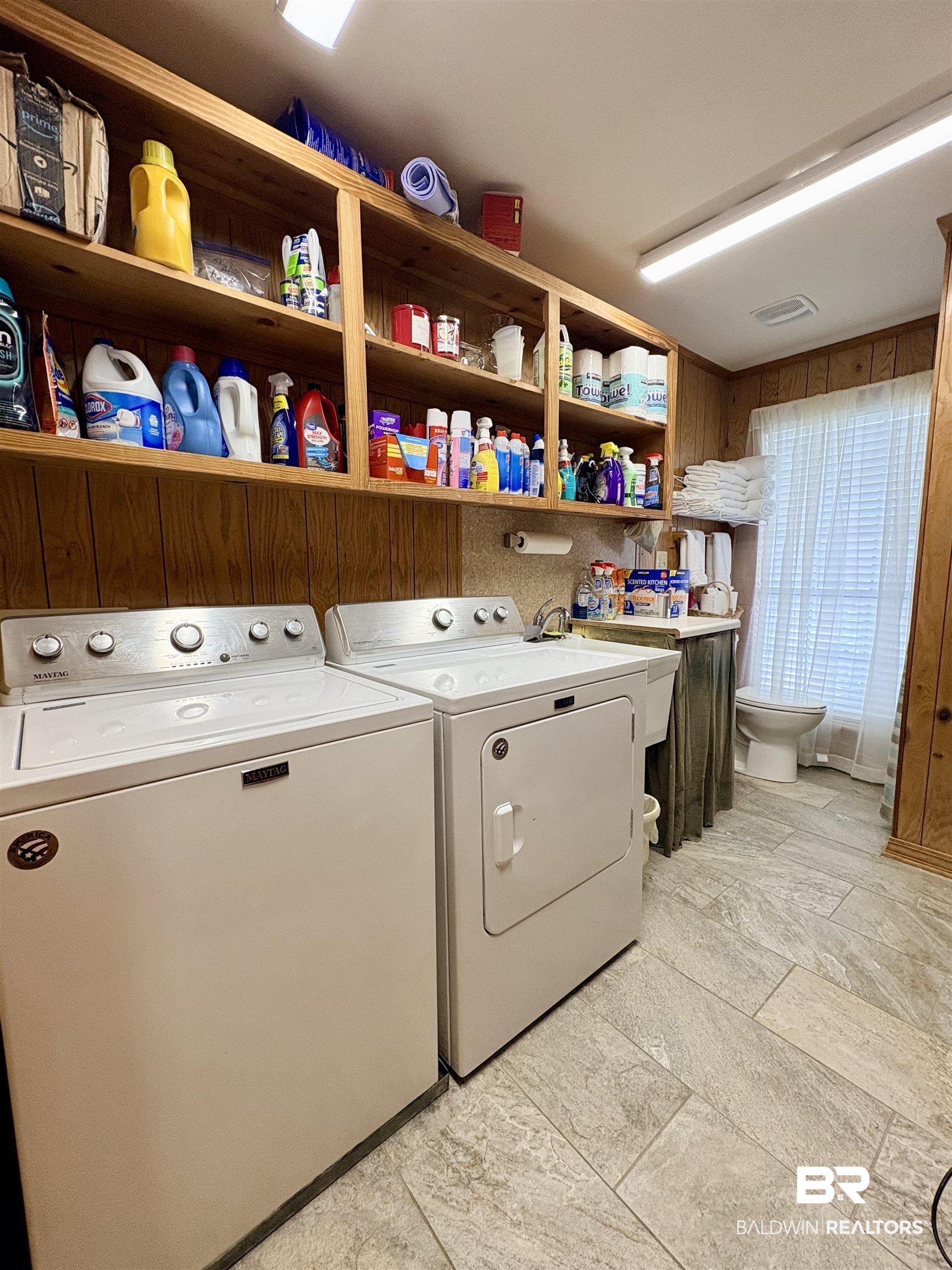44 Ridge Road Castleberry, AL 36432 - Photo 15 of 33 Laundry room featuring washing machine and dryer and a sink