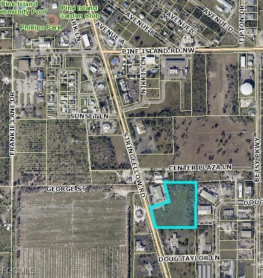 10250 Stringfellow Road St. James City, FL 33956 - Photo 2 of 8 a view of building