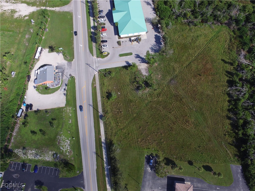 10250 Stringfellow Road St. James City, FL 33956 - Photo 3 of 8 an aerial view of a house