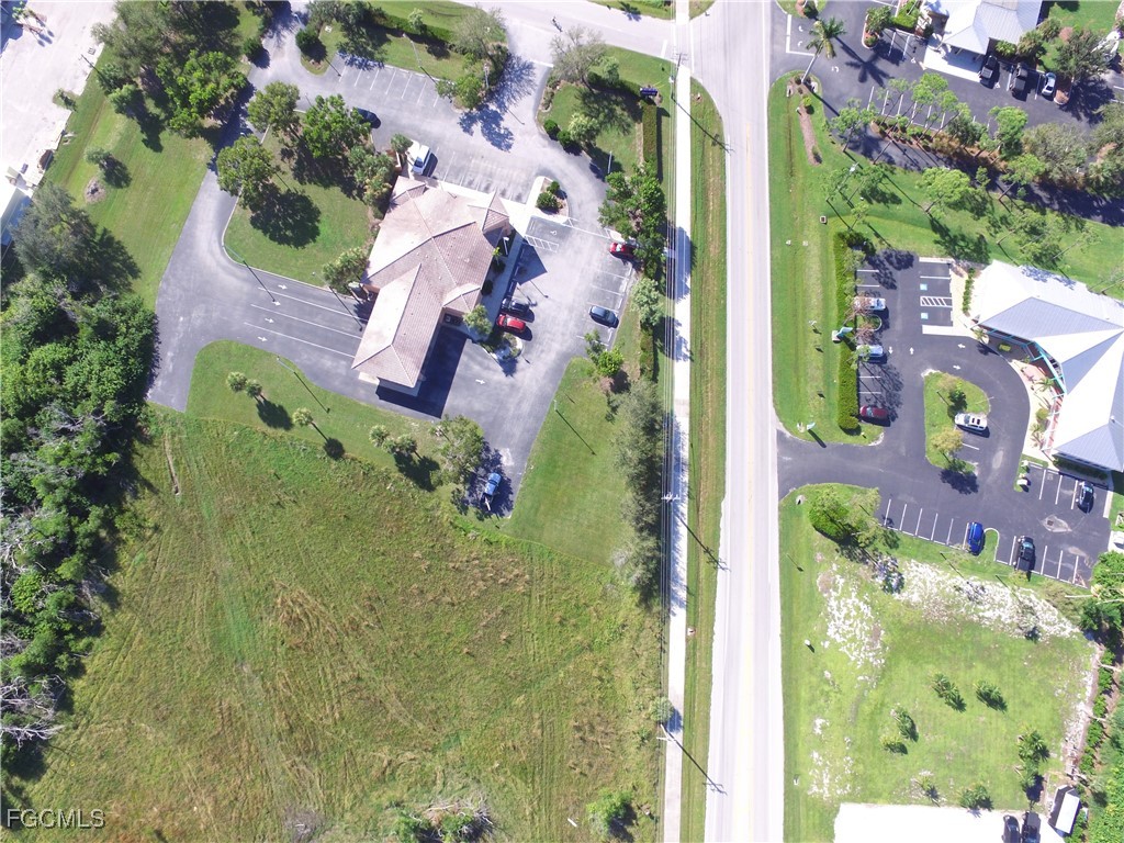 10250 Stringfellow Road St. James City, FL 33956 - Photo 5 of 8 an aerial view of a house