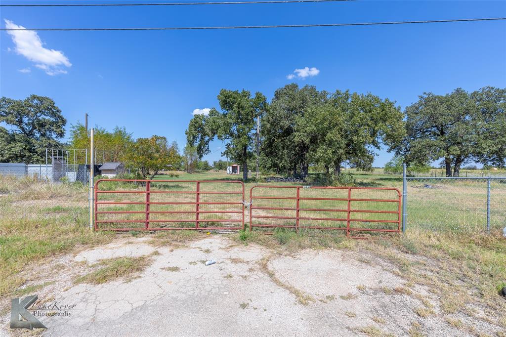 318 South Access Road Clyde, TX 79510 - Photo 1 of 1 View of yard featuring a gate