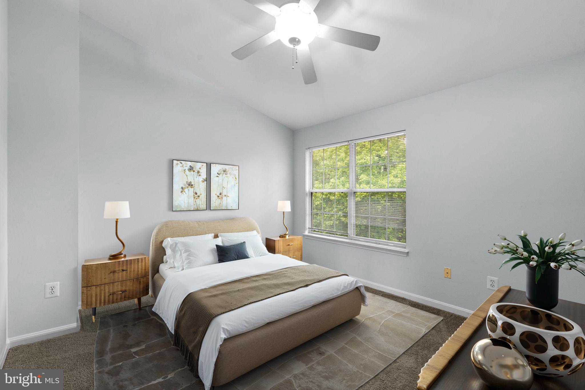 2204 Commissary Circle Odenton, MD 21113 - Photo 22 of 49 a bedroom with a bed and a chandelier