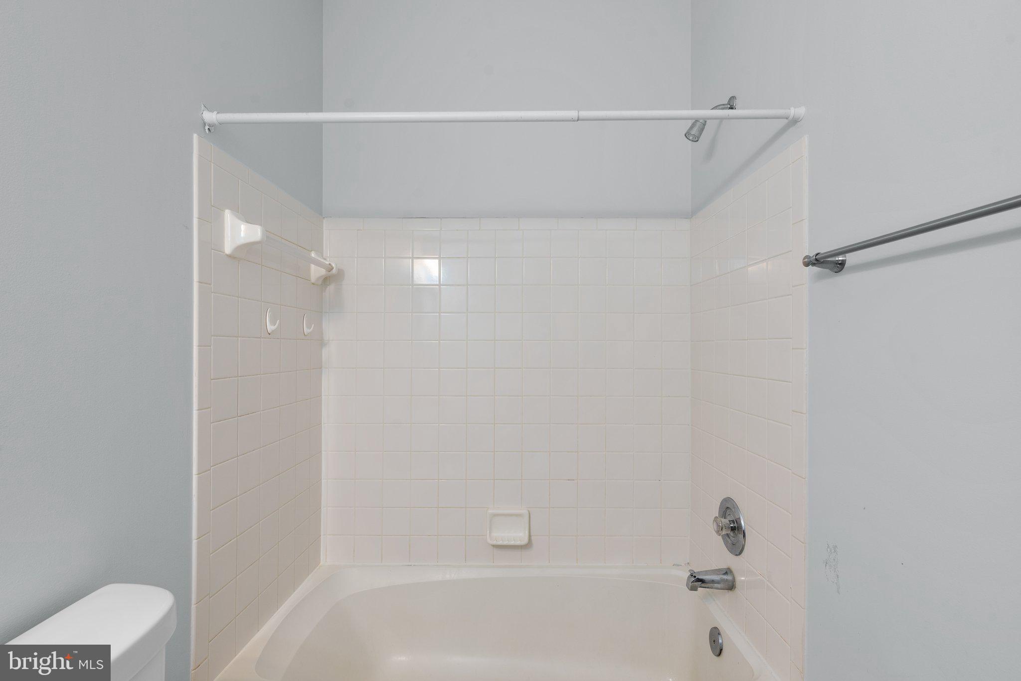 2204 Commissary Circle Odenton, MD 21113 - Photo 33 of 49 a bathroom with a bathtub