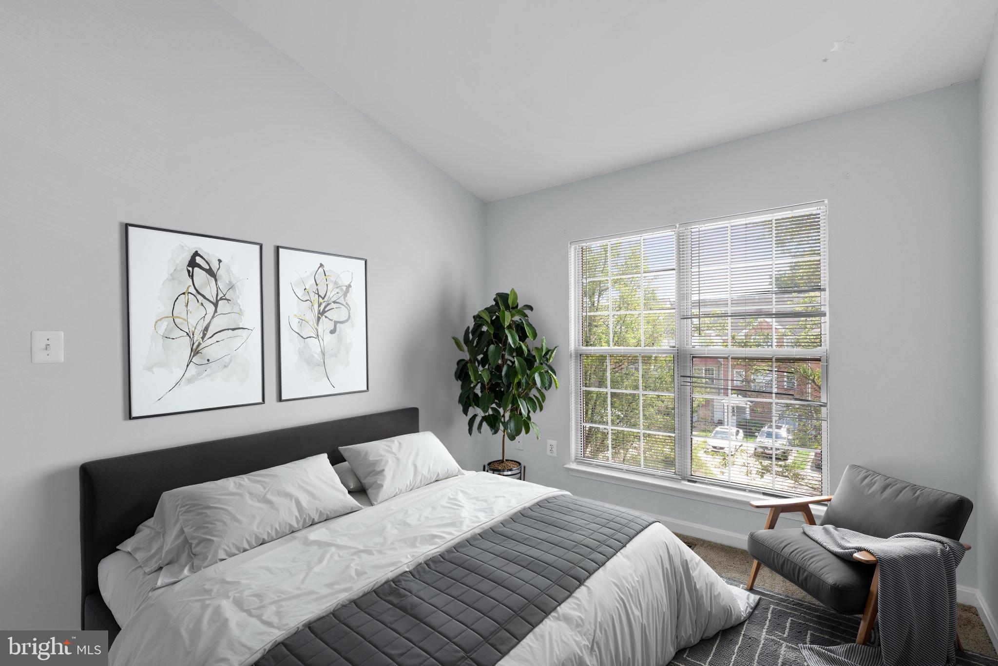 2204 Commissary Circle Odenton, MD 21113 - Photo 34 of 49 a bedroom with a large bed and a window