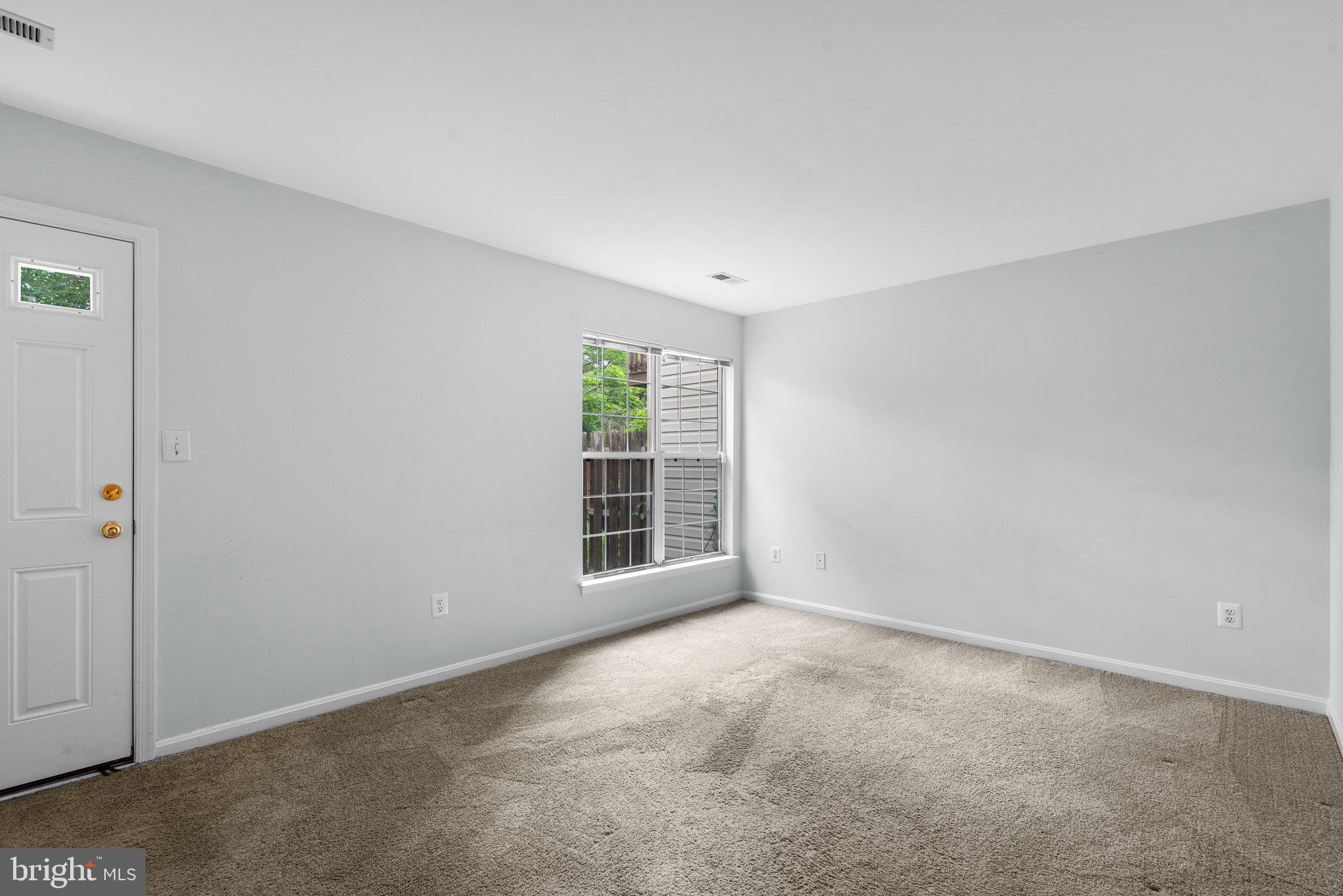 2204 Commissary Circle Odenton, MD 21113 - Photo 38 of 49 a view of an empty room with a window