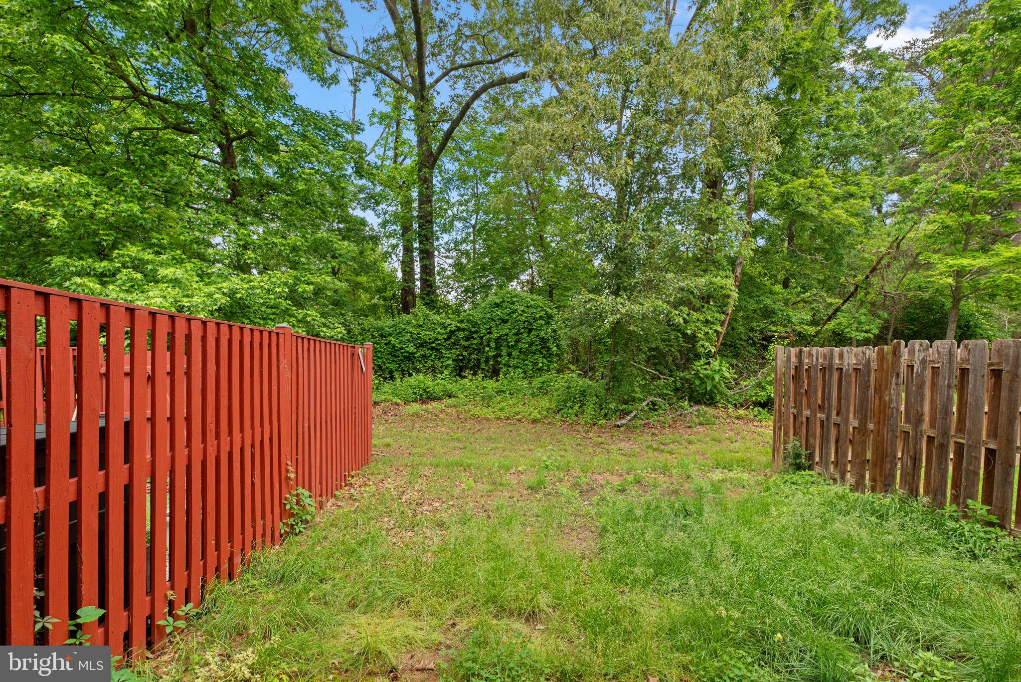 2204 Commissary Circle Odenton, MD 21113 - Photo 43 of 49 a view of a backyard with wooden fence