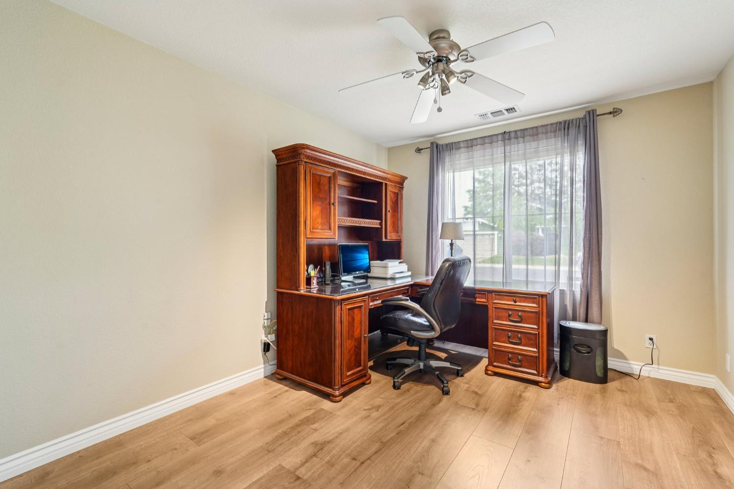164 Legacy Street Manteca, CA 95337 - Photo 18 of 33 a view of workspace with furniture and a window