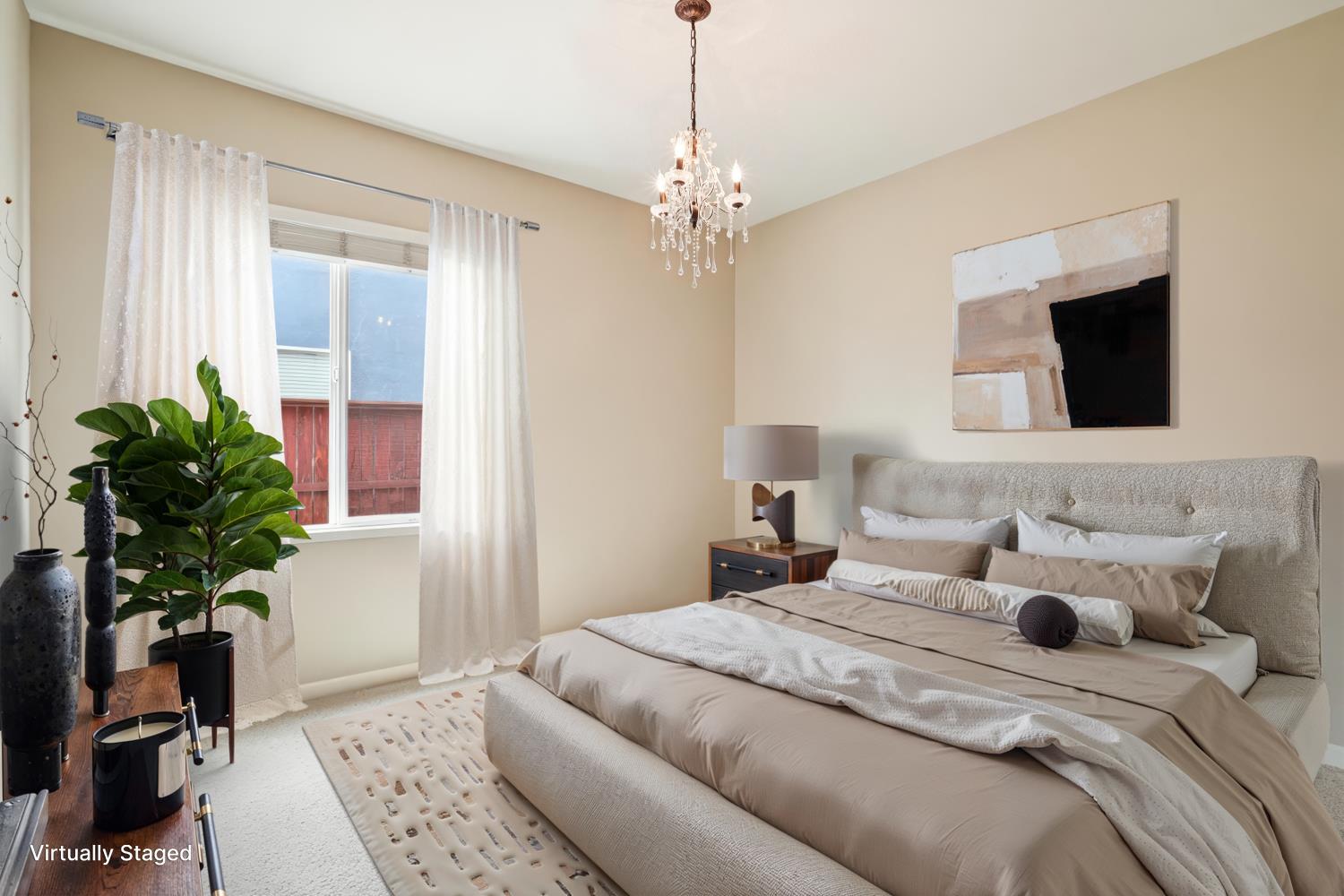 164 Legacy Street Manteca, CA 95337 - Photo 21 of 33 a bedroom with a bed and a potted plant