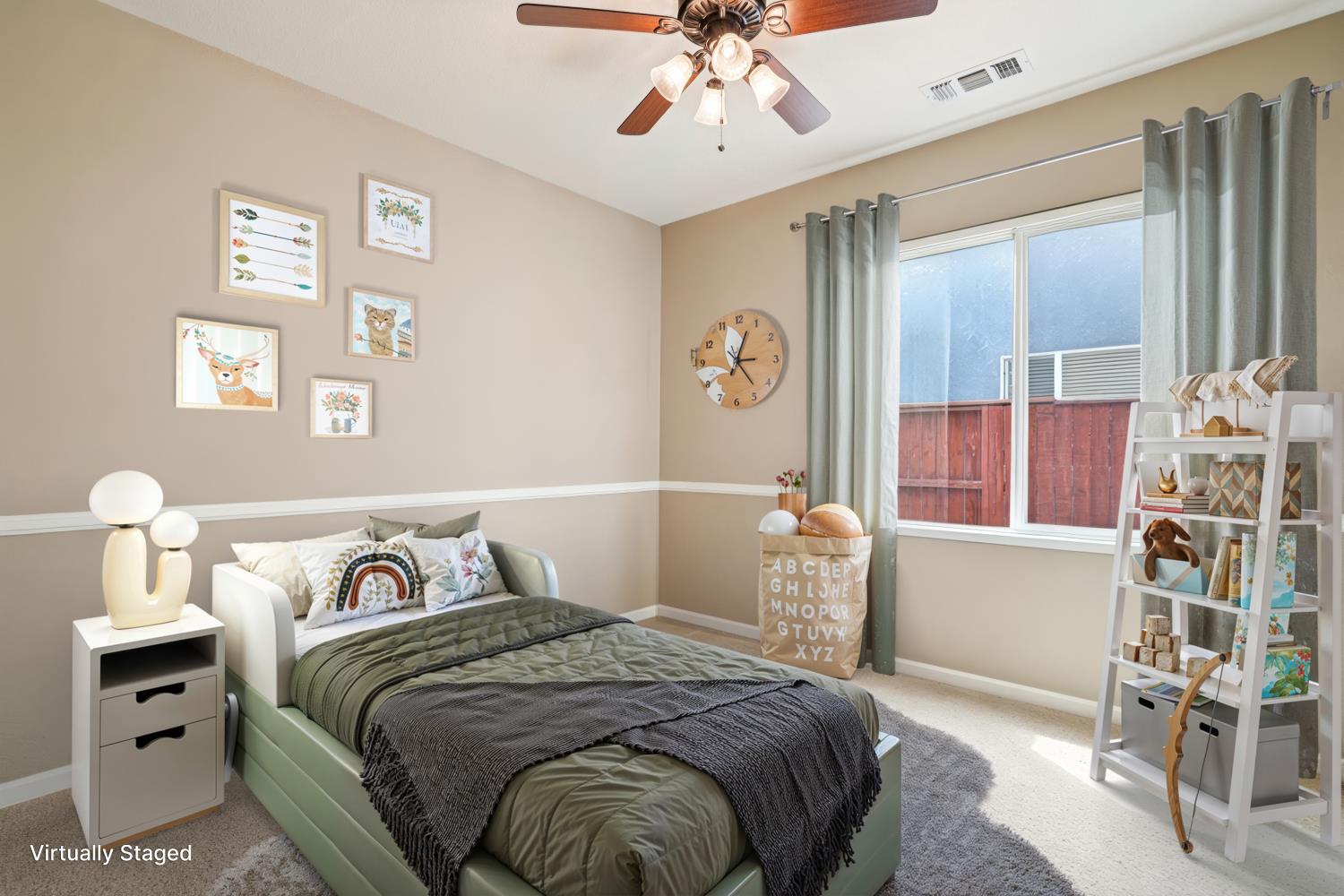 164 Legacy Street Manteca, CA 95337 - Photo 24 of 33 a bedroom with a bed and a chandelier