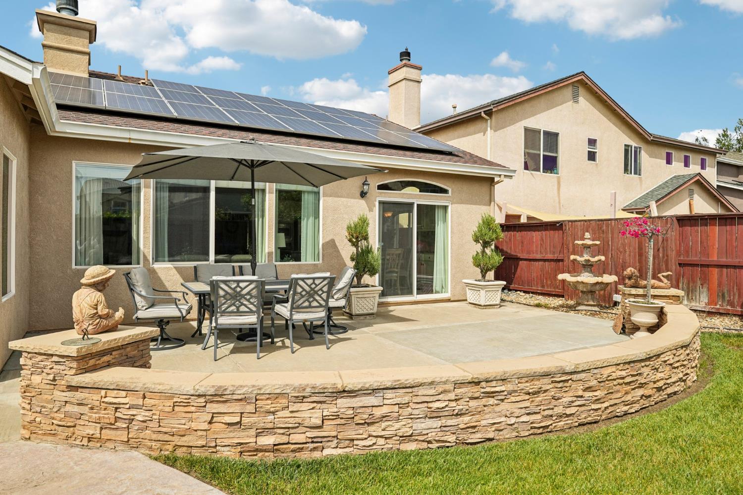 164 Legacy Street Manteca, CA 95337 - Photo 31 of 33 a view of a house with patio