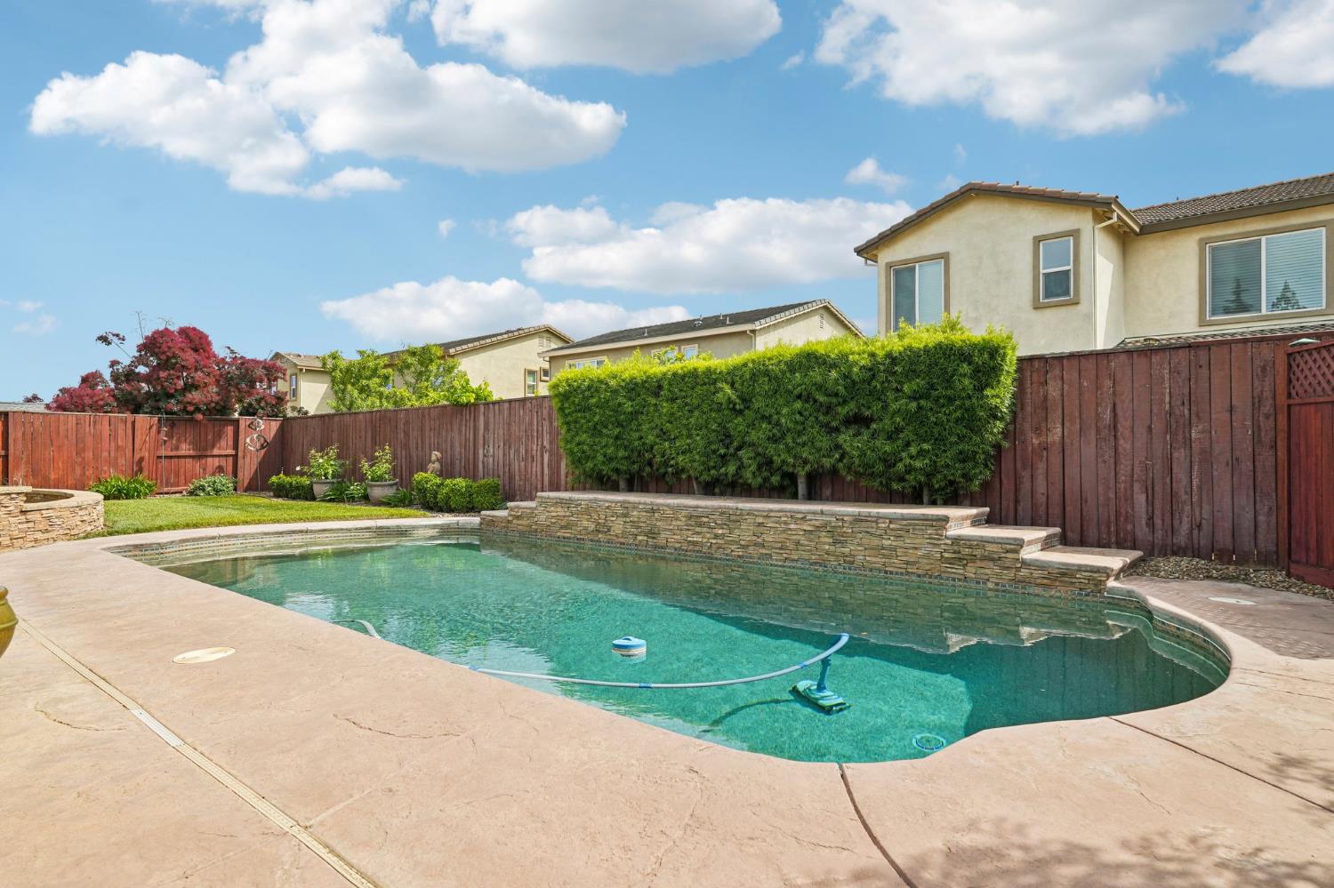 164 Legacy Street Manteca, CA 95337 - Photo 33 of 33 a house view with a garden space