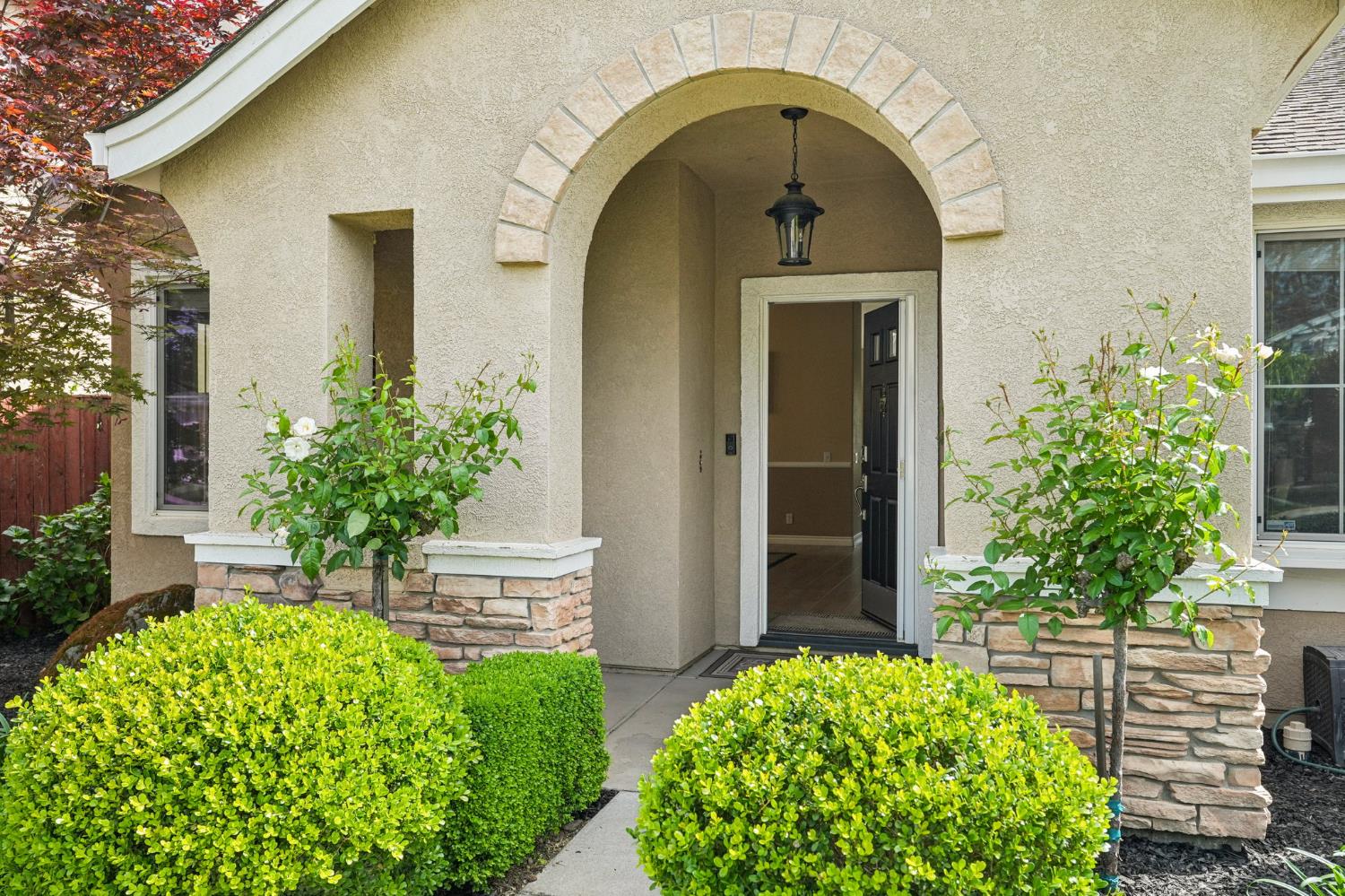 164 Legacy Street Manteca, CA 95337 - Photo 5 of 33 a front view of a house with garden