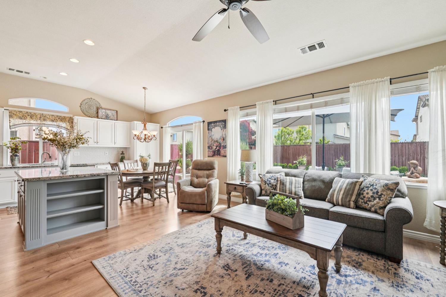 164 Legacy Street Manteca, CA 95337 - Photo 8 of 33 a living room with furniture and a large window