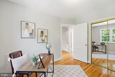 a view of a livingroom with furniture and wooden floor