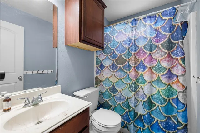 a view of a livingroom with furniture and window