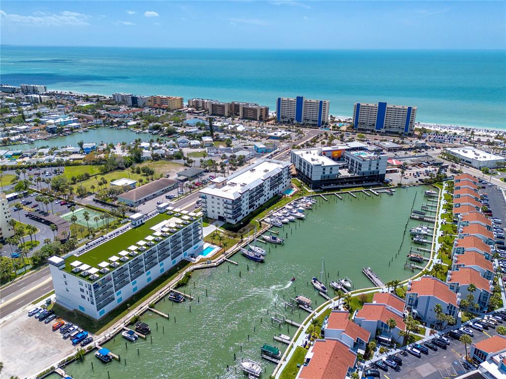 400 150th Avenue, Unit 501 Madeira Beach, FL 33708 - Photo 21 of 76 a view of a city with an ocean view