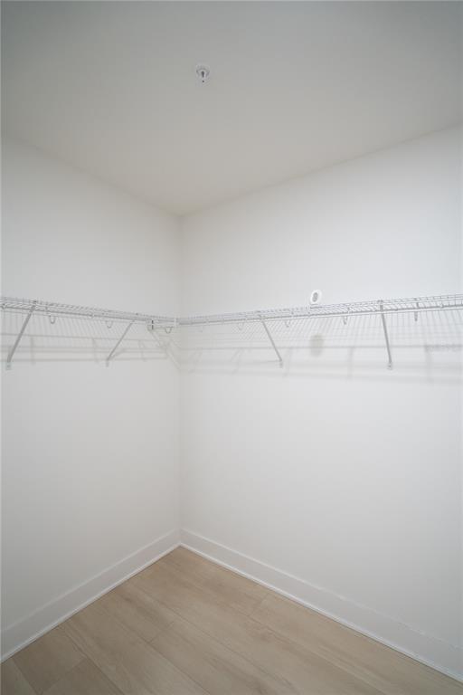 400 150th Avenue, Unit 501 Madeira Beach, FL 33708 - Photo 43 of 76 a view of a room with racks on the wall