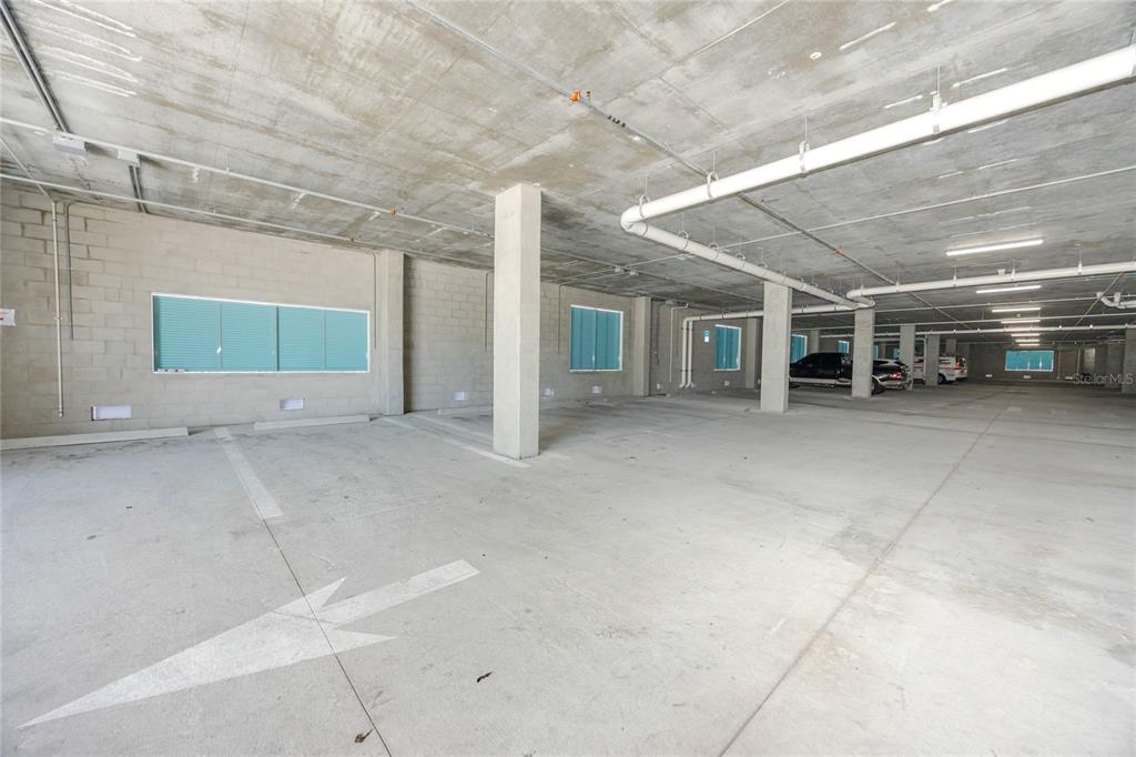 400 150th Avenue, Unit 501 Madeira Beach, FL 33708 - Photo 59 of 76 a view of an empty room with windows
