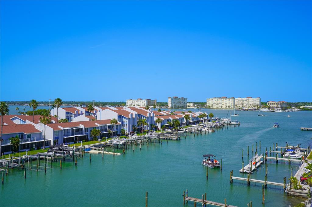 400 150th Avenue, Unit 501 Madeira Beach, FL 33708 - Photo 62 of 76 a view of a lake with houses