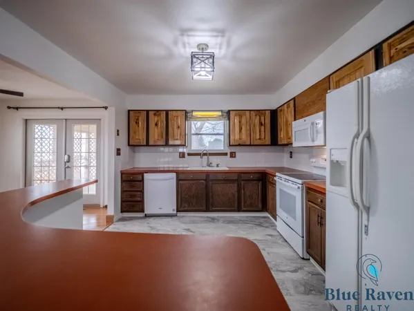 $305,000 | 905 19th Street, Wheatland, WY 82201